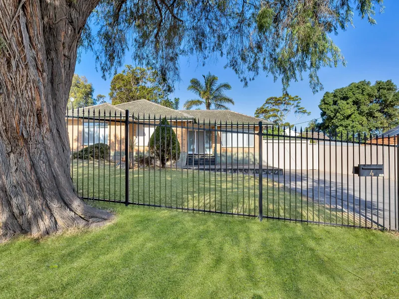 neat three bedroom home with a pool