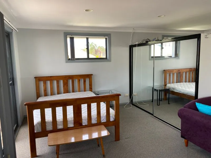 Freshly renovated, furnished apartment with air con - walking distance to the beach! ALL bills included.