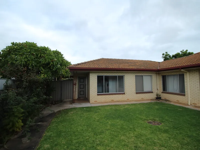 Spacious 2 Bedroom Unit with Private Rear Yard