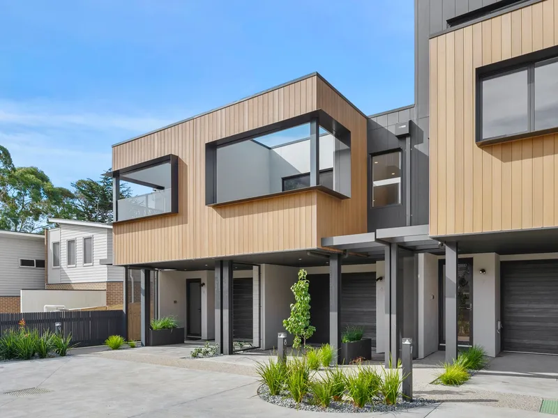 A High-End Masterpiece Footsteps from Highton Village