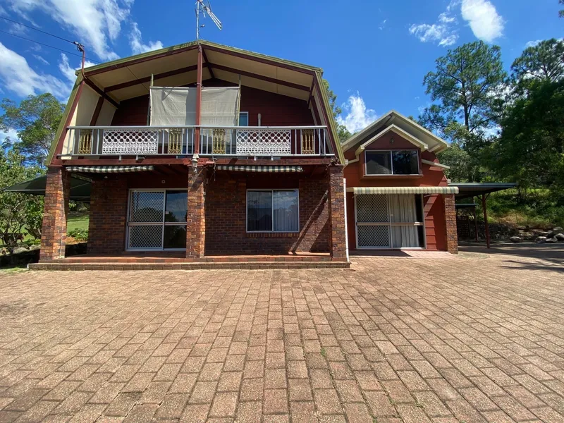 SEMI-ACREAGE HOUSE IN GREAT LOCATION WITH SHED + EXTRA PARKING