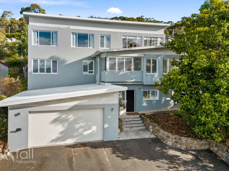 Large energy efficient home with water and mountain views