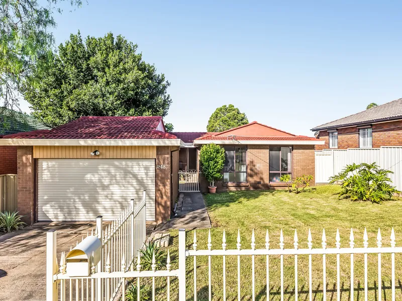 BRICK HOME WITH MULTIPLE LIVING AREAS