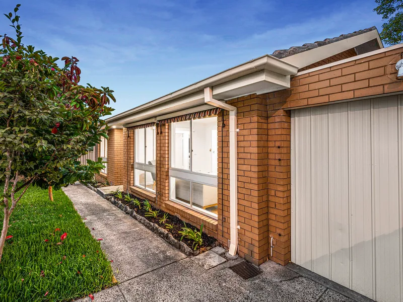 Contemporary single level living with every convenience at its door