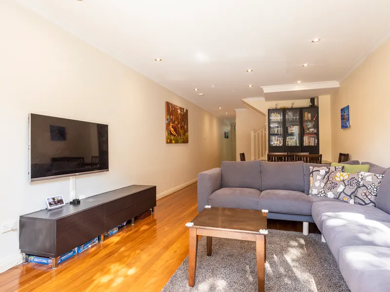 Over three levels, three bedroom terrace with two bathrooms & parking!