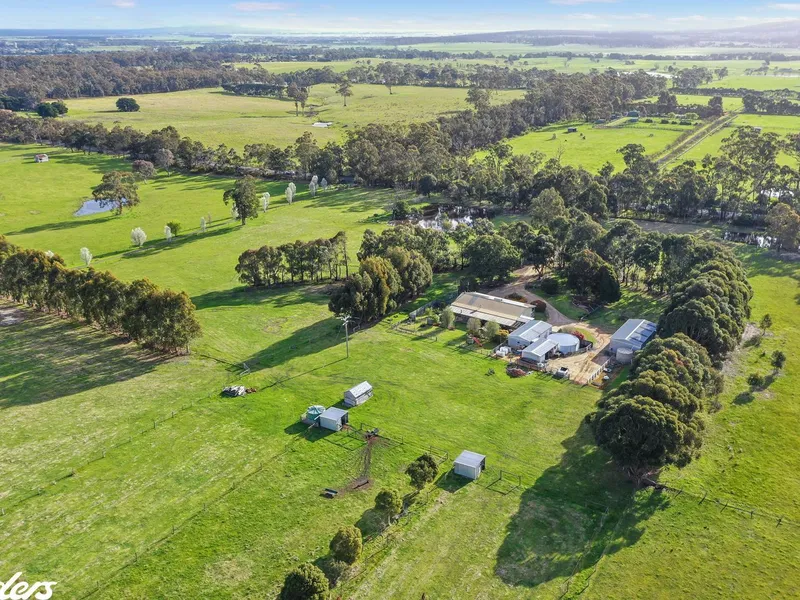 COMFORTABLE LIVING ON 15 ACRES