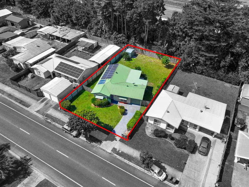 WHERE LOCATION MEETS POTENTIAL - SOLAR, SIDE ACCESS, MASSIVE YARD