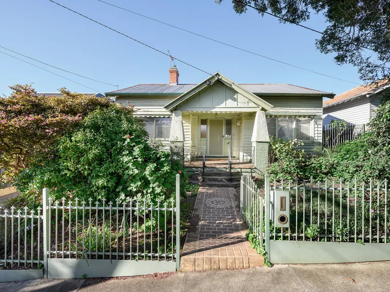 Original Bungalow with Position and Potential!
