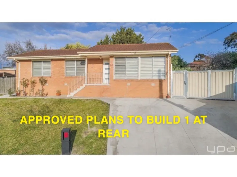 LOOKING FOR YOUR NEXT HOME WITH PLANS AND PERMIT TO BUILD ANOTHER 3 BEDROOM 3 BATHROOM TOWNHOUSE ON THE REAR.