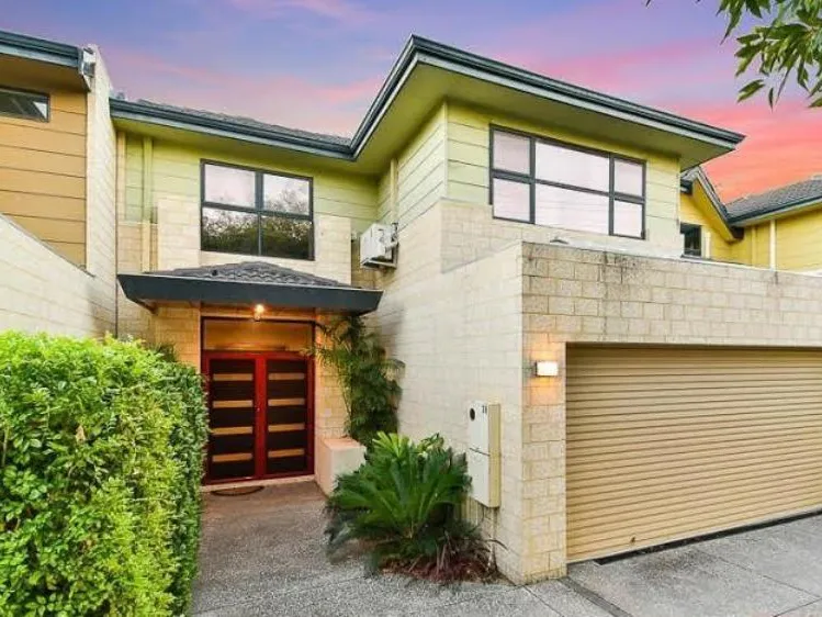 Superb A/C street frontage executive townhouse  NO STRATA LEVIES