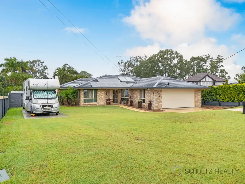 Perfect spacious family home! Flat 1105m2 block, inground pool, 3 living areas, side access and caravan parking