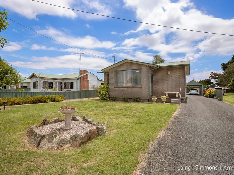 Unlock the Potential- Classic Brick Home in a Central Location