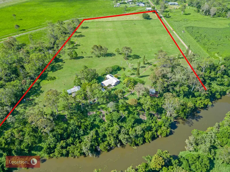 14 ACRES ON THE RIVER WITH DUAL LIVING OPTIONS! A MUST-SEE PACKAGE…