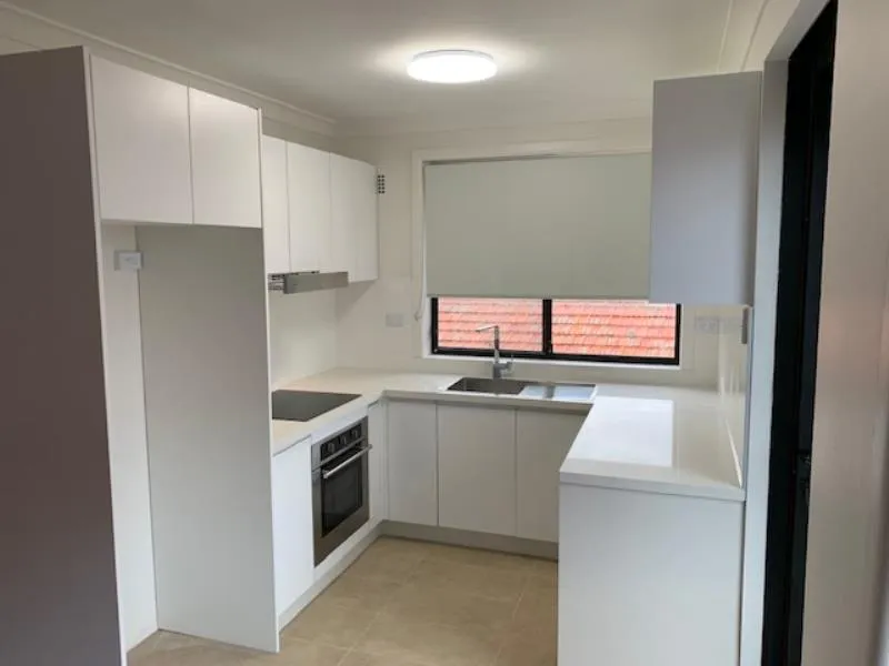 BRIGHT FULLY RENOVATED TOP FLOOR TWO BEDROOM APARTMENT