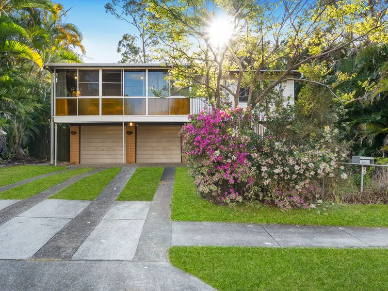 Charming High-Set Home with Sunroom, Study, and Expansive Outdoor Space