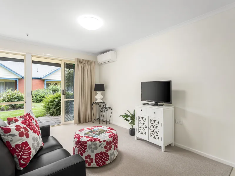 Serviced apartment with balcony and garden views