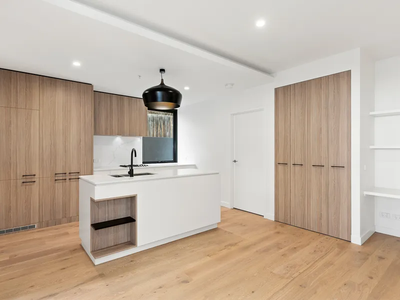 AS NEW TWO BEDROOM, TWO BATHROOM WITH LARGE COURTYARD