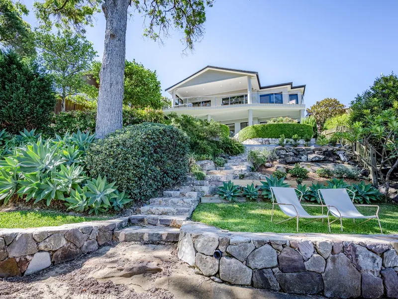 Exquisite home; prestigious waterfront setting