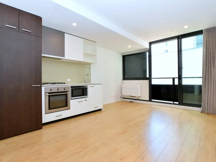 UNFURNISHED with WHITE GOODS 1-bedroom apartment complemented with car space & storage.