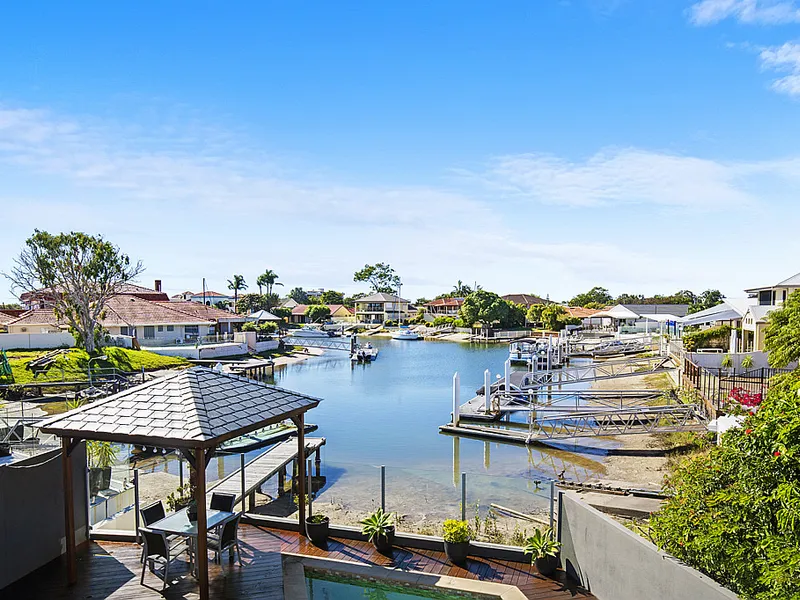 Superior and Stylish Waterfront Living in an Exclusive Enclave