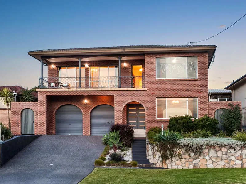 5 bedroom family home showcasing an array of formal and informal living areas set over two levels