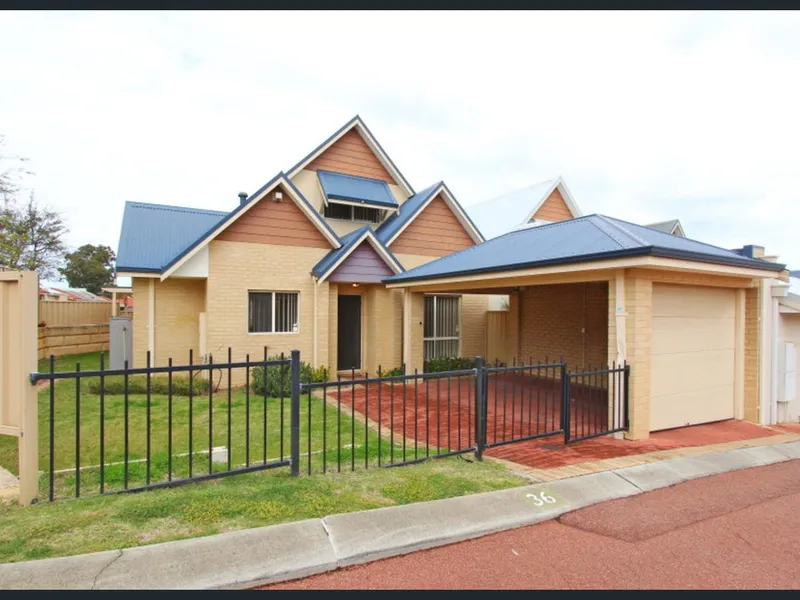 TOWN HOUSE IN FRIENDLY, GATED COMMUNITY