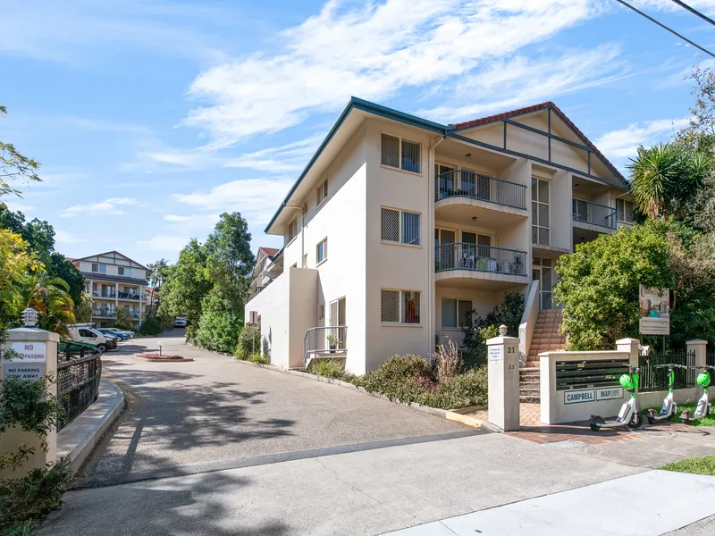 Leafy Corner-Block Apartment with Creek Views