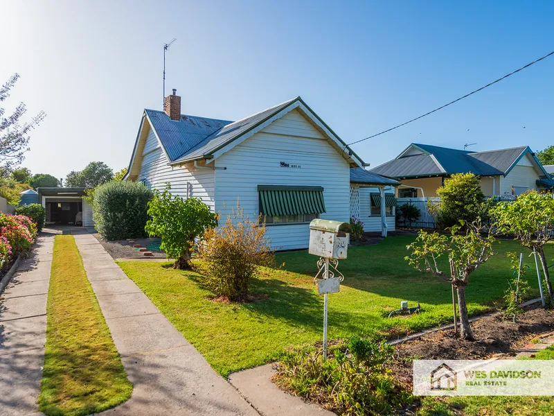 Neat Weatherboard Home