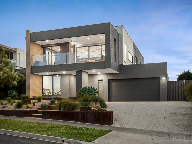 Sophisticated Family Entertainer with Sweeping Coastal Views