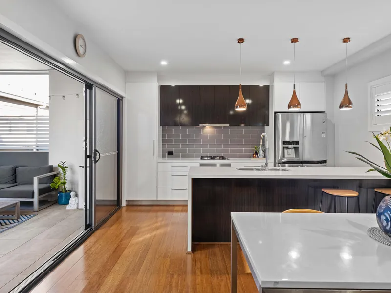 Flawless Dual Level Townhome Exuding Luxury