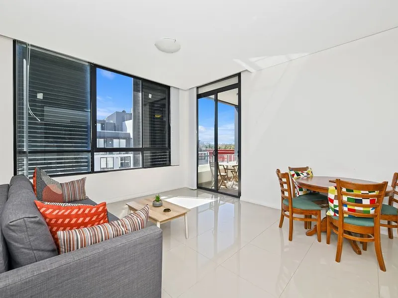 Sun-filled Top floor apartment with large car space