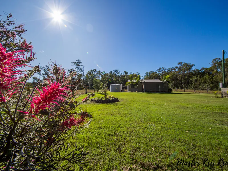 Lush Creek frontage acreage