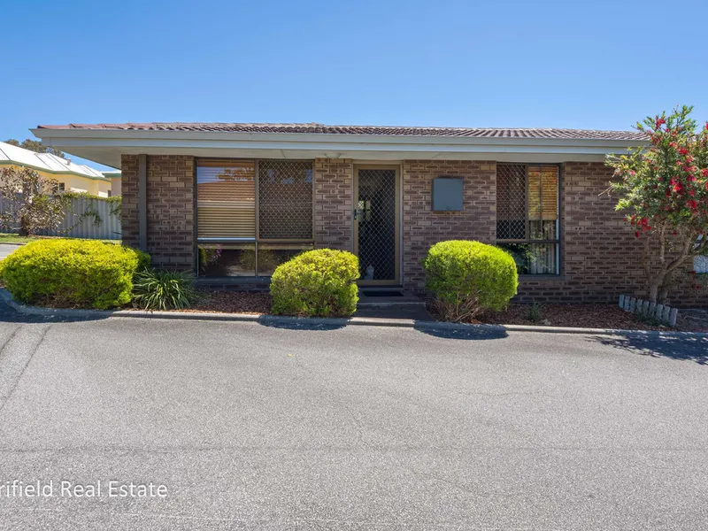 HALFWAY BETWEEN TOWN & BEACH