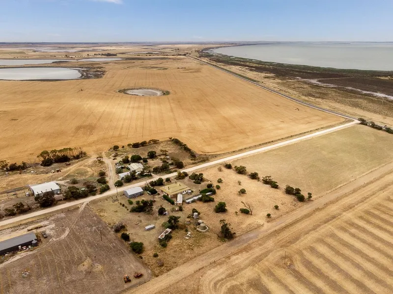 284.66 acres with Home and Sheds on 2 titles