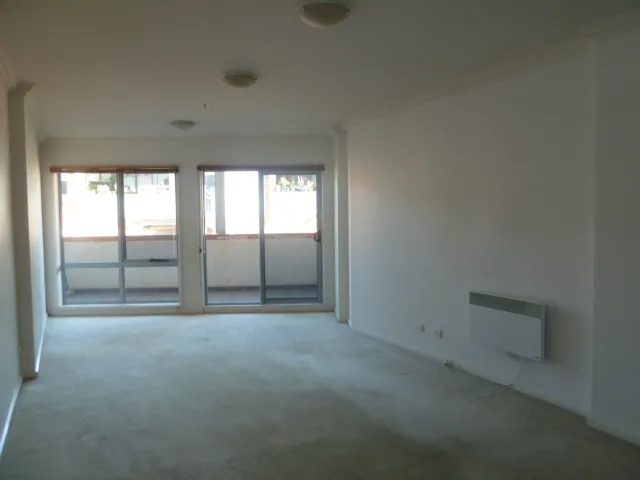 Three bedroom, two bathroom modern apartment with one off street car space.
