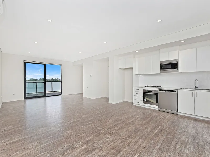 DESIGNER SUN FILLED TWO (2) BEDROOM PLUS STUDY APARTMENT