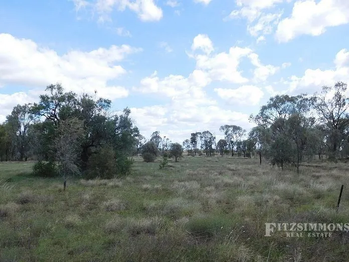 SWEEPING RURAL VIEWS, CREEK FRONTAGE & WELL TREED