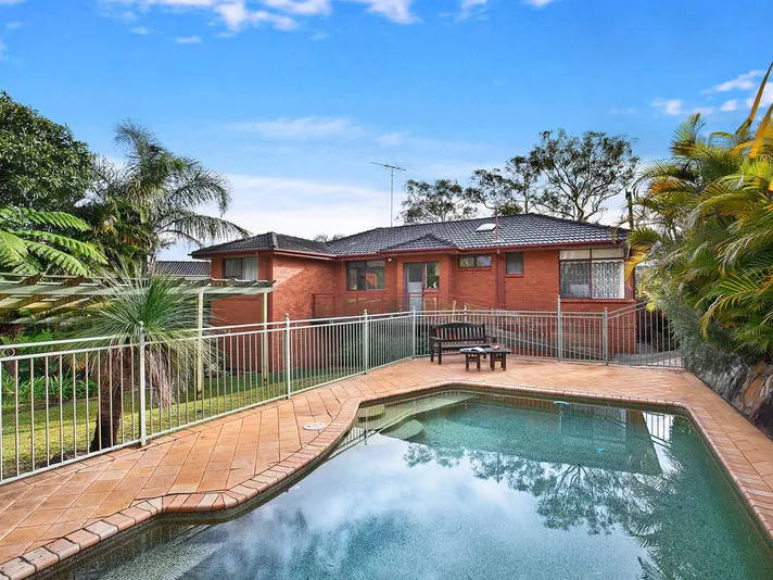 Flexible family home with extensive outdoor entertaining and pool