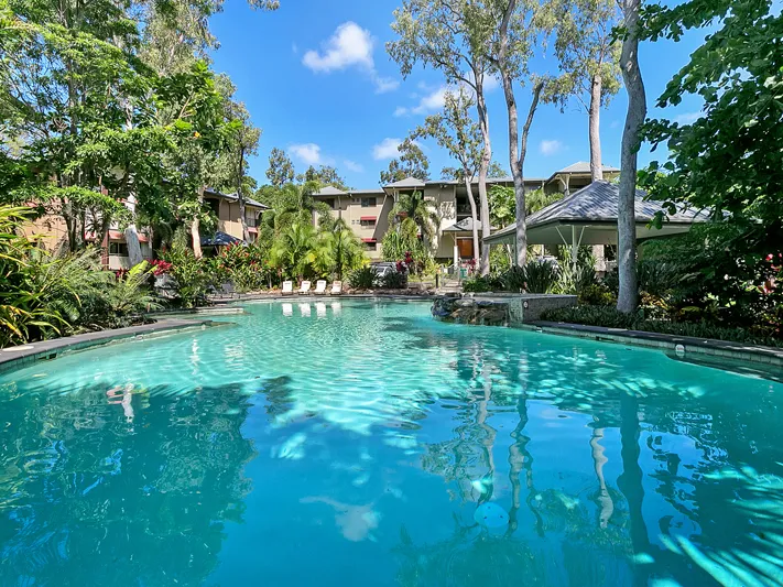 Classy Modern Apartment- lift, 2 bedroom, 2 bathroom, separate study, large balcony set in a lush environment with low body corporate fees.$360,000.