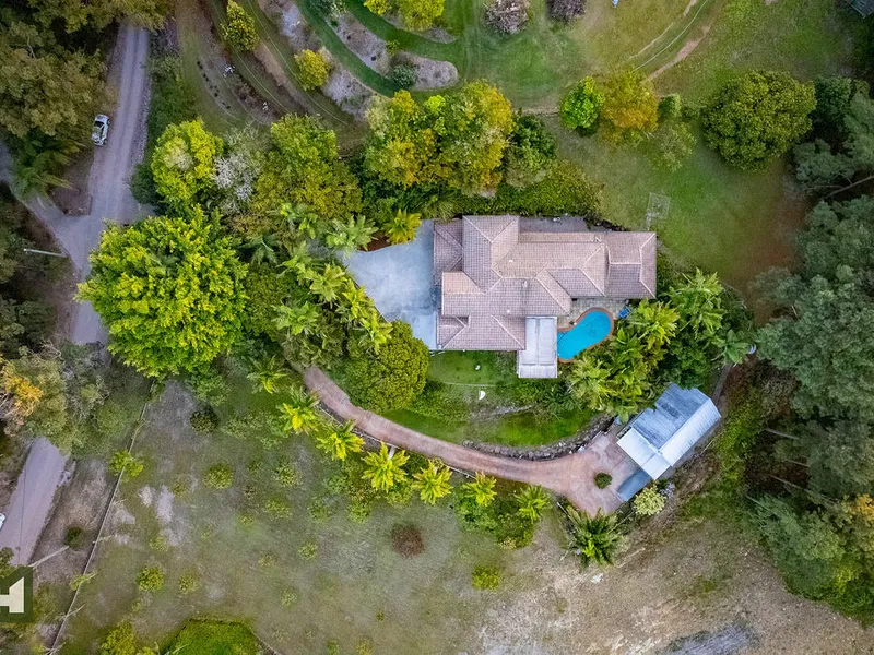 Stunning Acreage property with ocean vistas and two residences