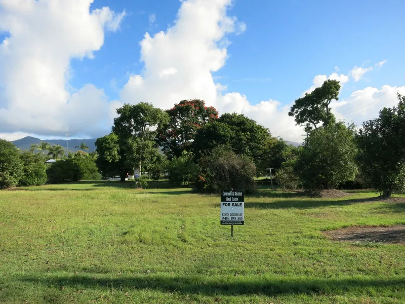 Large vacant corner block with three street...