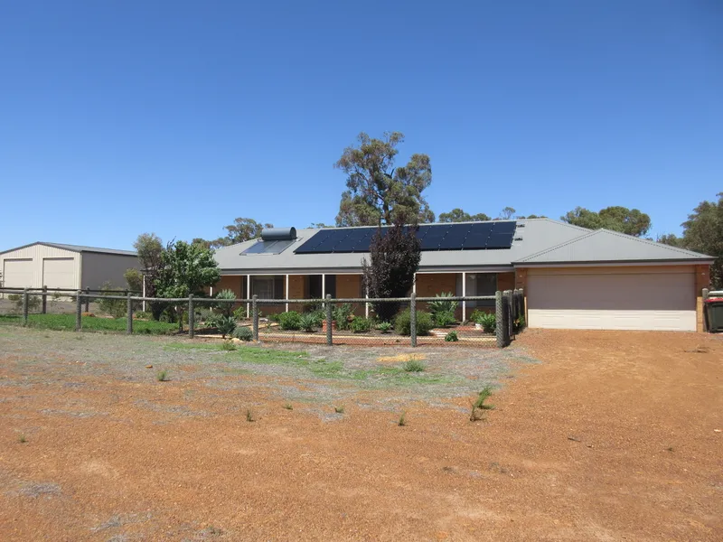 Set on 5 Acres  4 x 2 with double lockup garage and below ground pool.