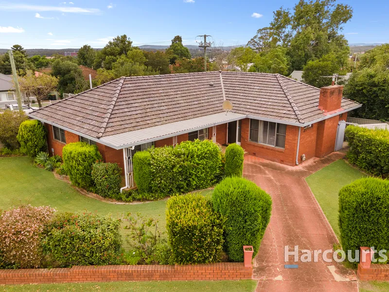 Solid Home on Family Sized Block in a Family-Friendly Location