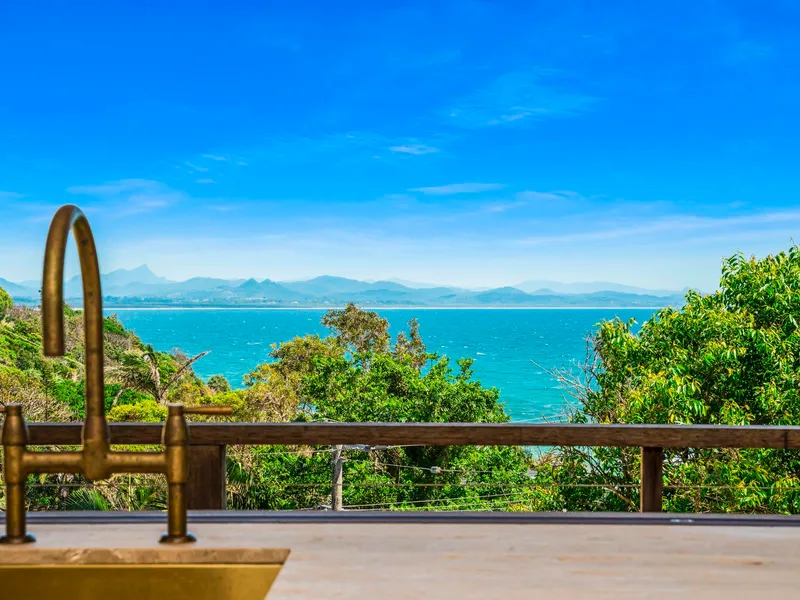 Tri-level Wategos home with epic views