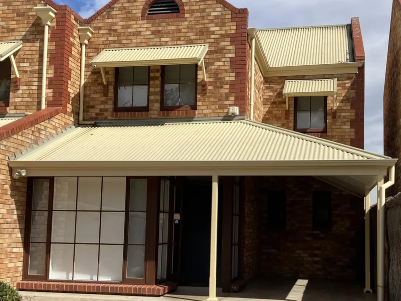 Lovely, updated & low maintenance 3-Bed, 1.5-Bath Townhouse in premium location