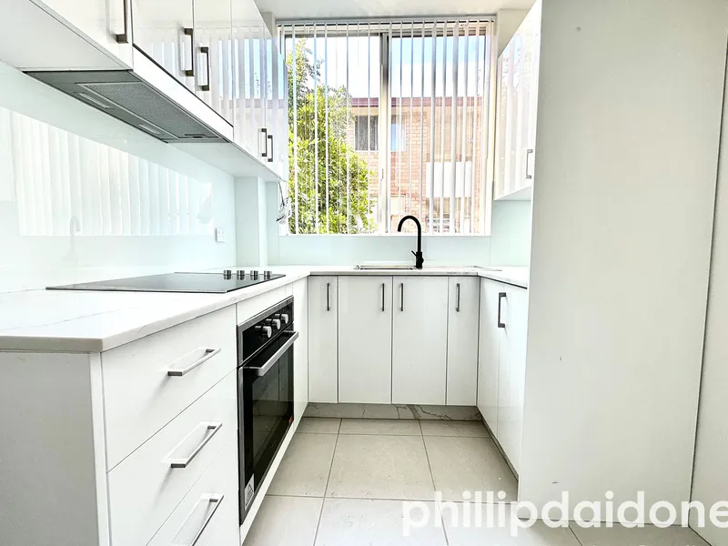 OPPOSITE TRAIN STATION, NEWLY RENOVATED 2 BEDROOM UNIT