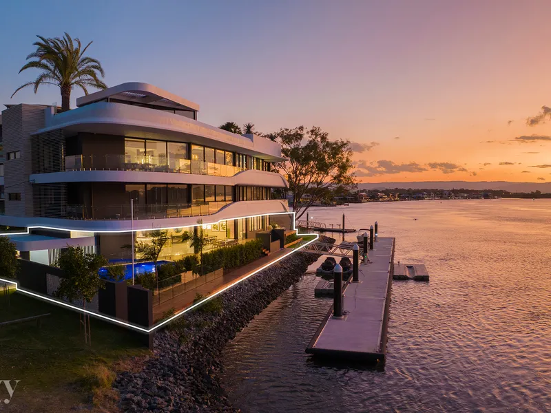 FULL FLOOR GROUND LEVEL LUXURY WATERFRONT APARTMENT WITH A PRIVATE YARD ON THE MAIN RIVER