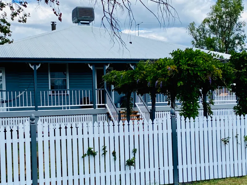 Lovingly renovated - Move-in ready - Four-bedroom Queenslander