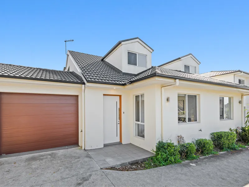 Serene and stylish townhome in a centrally convenient location