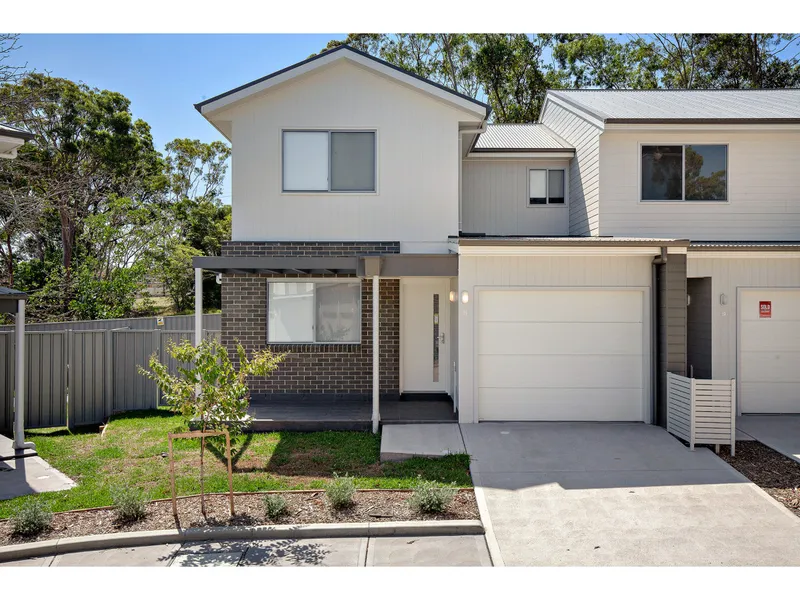 NEAR NEW TOWNHOUSE WITH EXCELLENT FINISHES AND CONVENIENTLY LOCATED